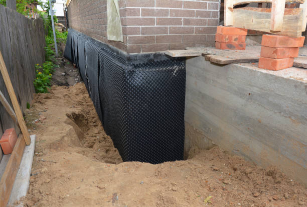 Happy homeowners after waterproofing job in Elizabethtown